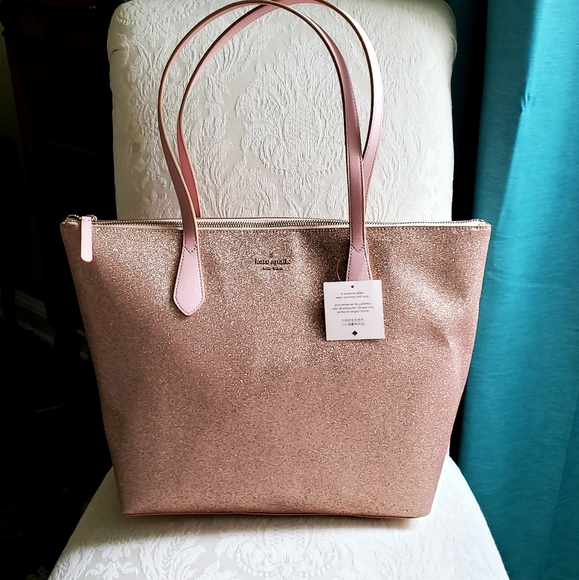 katy spade Handbags - Katy spade rose gold purse.  Large.